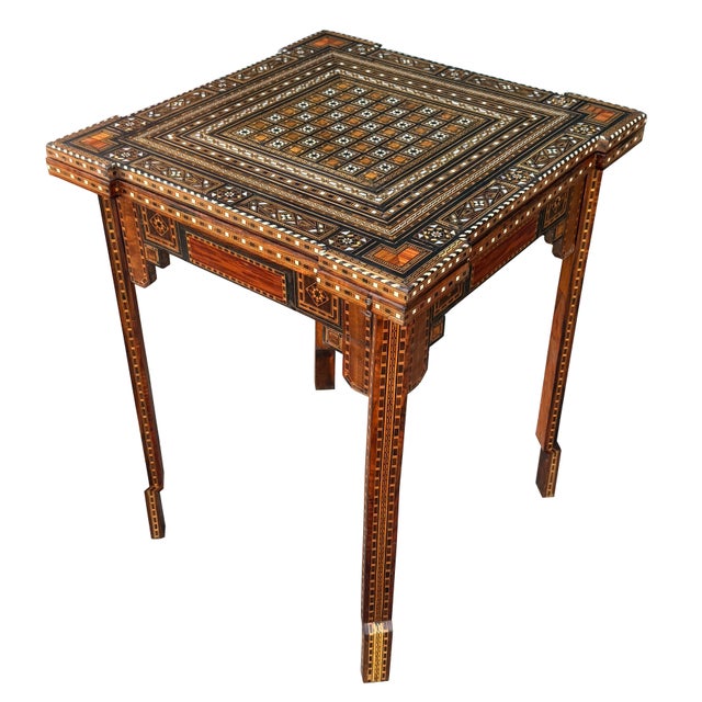 Early 19th century marquetry wood inlaid with mother of pearl. This one of kind game table made in Damascus Syria....