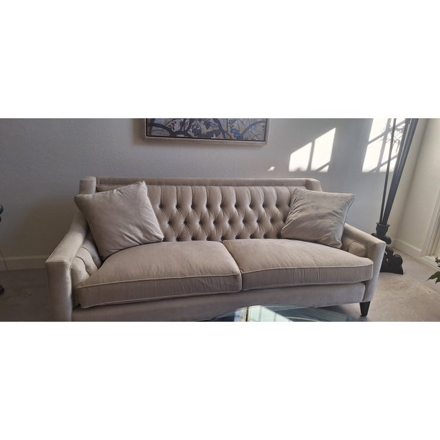 Very gently used custom made very comfortable sofa purchased from Arhaus. Tufted back with accent pillows, fits in with...