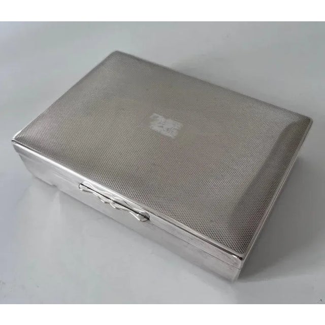 A lovely silver plate textured box from Paris. A wonderful decorative piece with a wooden interior. The box is a...