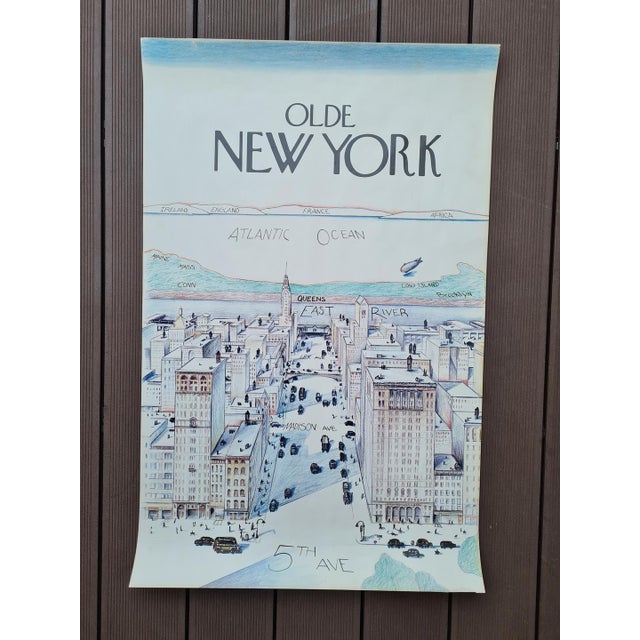 A decorative “Olde New York” poster depicting a stylized panorama of New York City with a distinctive view of 5th Avenue,...