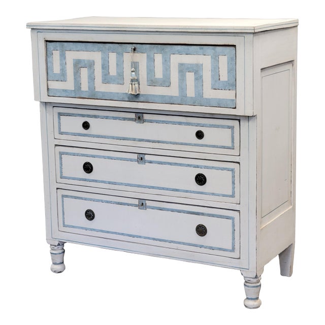 An absolutely stunning antique hand painted dresser with distressed white paint and pale blue trompe l'oeil French line...