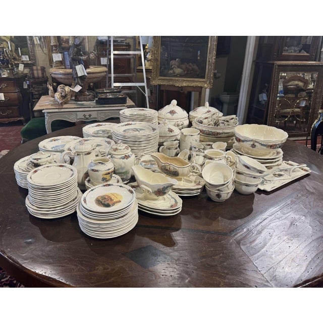 Decorate a dining table or shelving with this antique porcelain service set of approximatrly 208 pieces. Crafted in France...