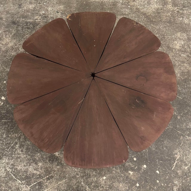 This is the iconic Petal coffee table designed by Richard Schultz for Knoll. It is made of eight redwood petals each...