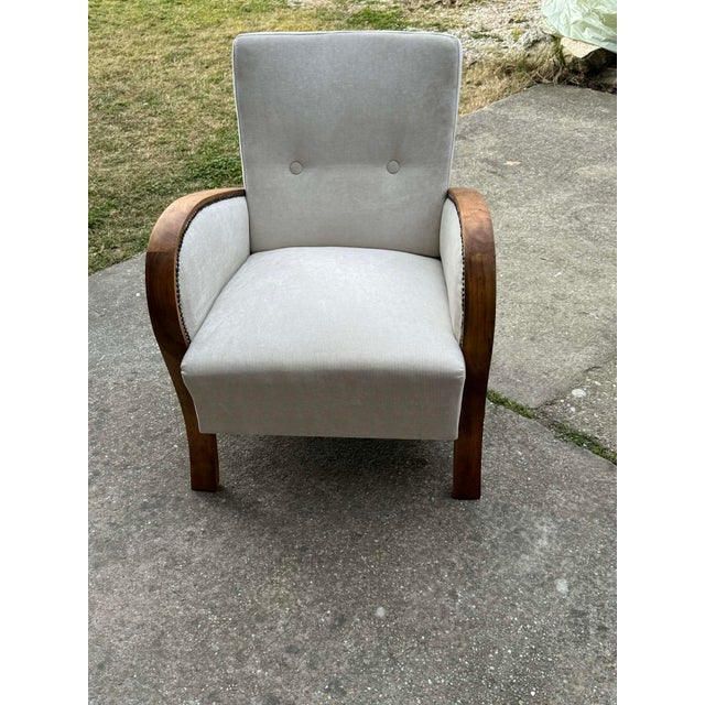 Hungarian Art Deco armchair. A very elegant Art Deco armchair, a new cream, beige upholstery. The wooden part was restored...