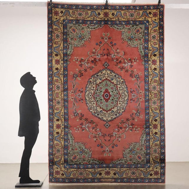 Tabriz rug in cotton and wool, large knot, manual production. This piece is attributed to the mentioned designer/maker. It...