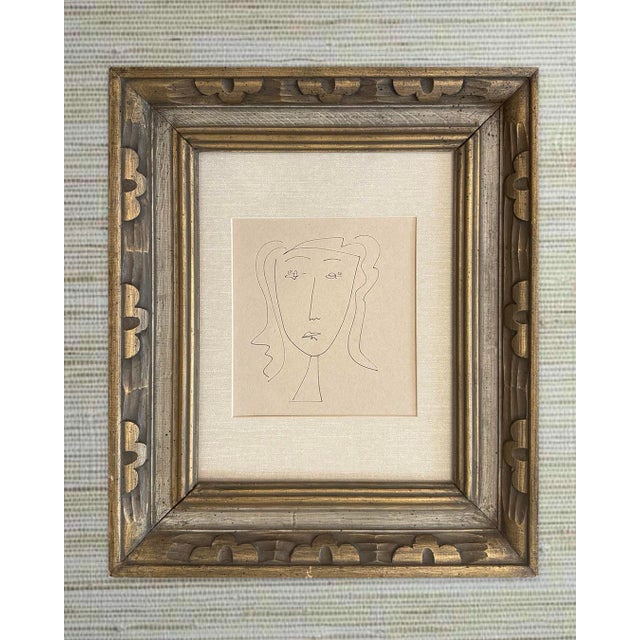 This original portrait was drawn in ink on tan paper and is matted and framed in a vintage frame. 17.5 in. wide x 20 in. high