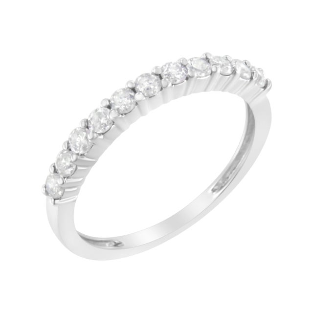 Elegant and timeless, this IGI certified 10K white gold diamond band features 0.5 carat total weight of round, brilliant...