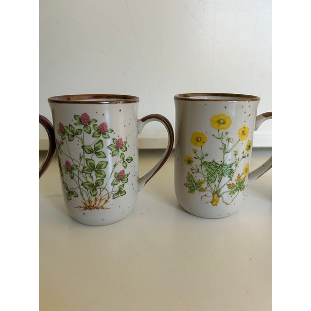 Vintage Field Daisy,Sweet Clov, Wild Pink, Buttercup Mixed Flowers Mugs , Marked Japan 2.75"D X 4.25"H They are in very...