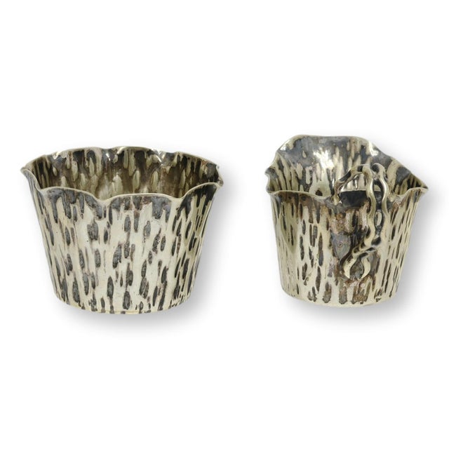 Rare late 19th century English silver plated cream and sugar set designed by Christopher Dresser for Hukin & Heath....