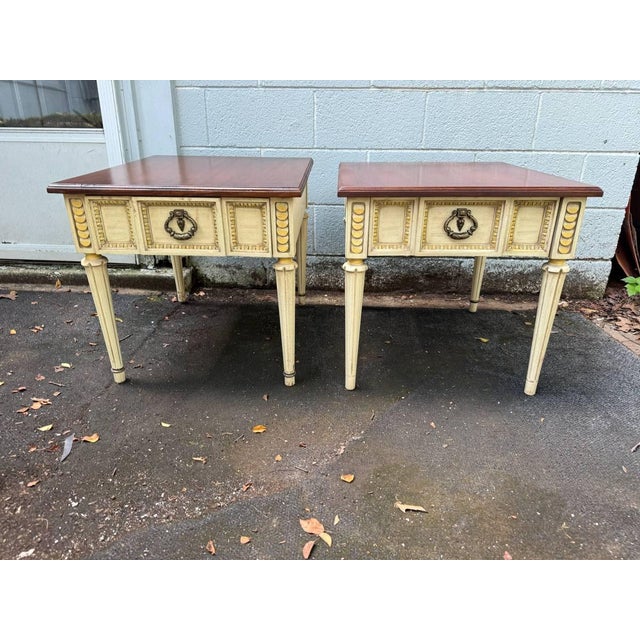 Pair of American Martinsville MCM Hollywood Regency Style Painted Accent Nightstands Side Tables. Solid wood frame, cream...