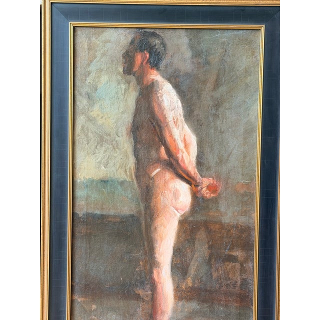 A beautifully executed antique academic figure study depicting a standing male nude in profile, rendered with remarkable...