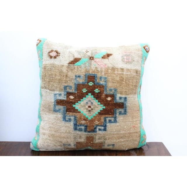 This Turkish pillow cover is made from the highest quality Vintage Rug in 100% wool on the front. The back is covered in...