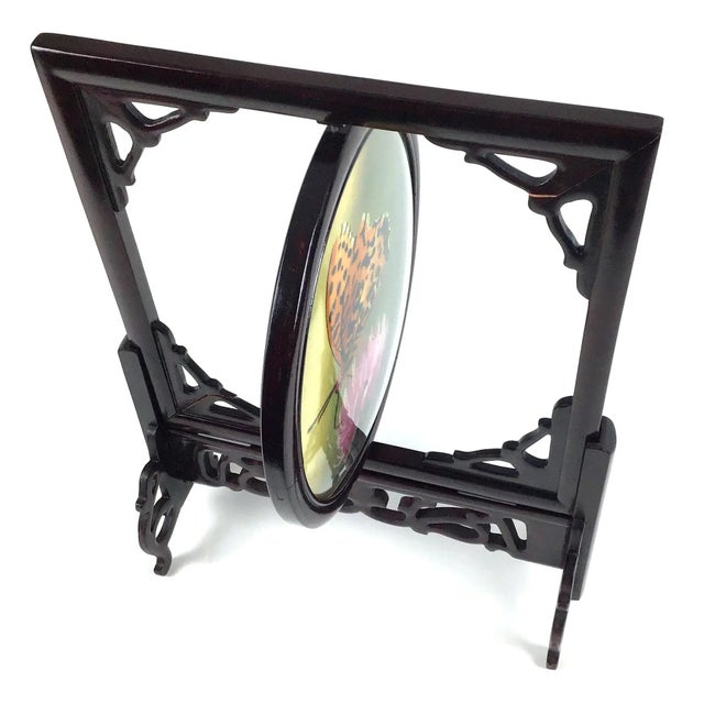 Pure silk threads have been intricately hand woven into a curved glass display dome visible on both sides. This type of...