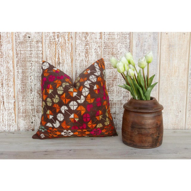 This colorful and luxurious Bagh Phulkari pillow features beautiful hand-done silk embroidery on top of a cotton fabric....
