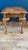 This beautifully crafted vintage solid oak side table features elegant carved shell accents and detailed etched cutouts. A...
