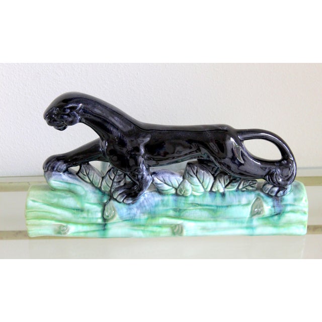 Bring iconic 1950s style into your home with this striking Mid-Century Modern black panther ceramic TV lamp base. Finished...