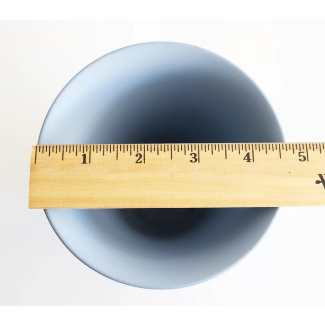 Add a touch of classic British elegance to your décor with this vintage Wedgwood Jasperware trumpet vase, also known as a...