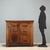 Chestnut sideboard dating back to the late 17th century, Italian craftsmanship. The front features a pair of bipartite...