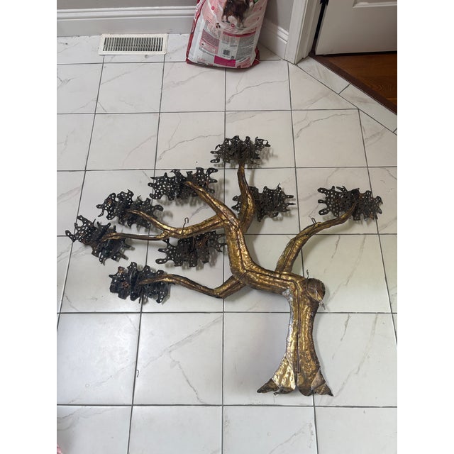 Brutalist Tree Sculpture, a popular style of mid-century modern home decor. These wall-mounted sculptures are typically...
