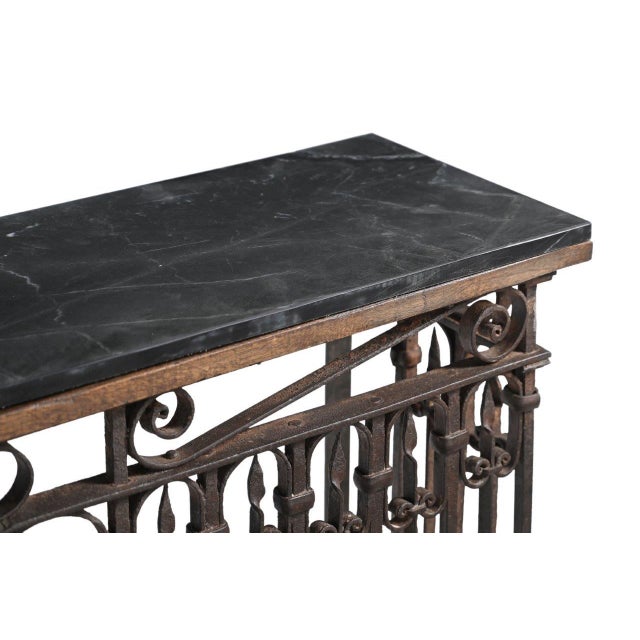 Antique Indian Cast-iron Balcony Front Console Table, the balcony front designed with spires, ovals, arrows and centered...