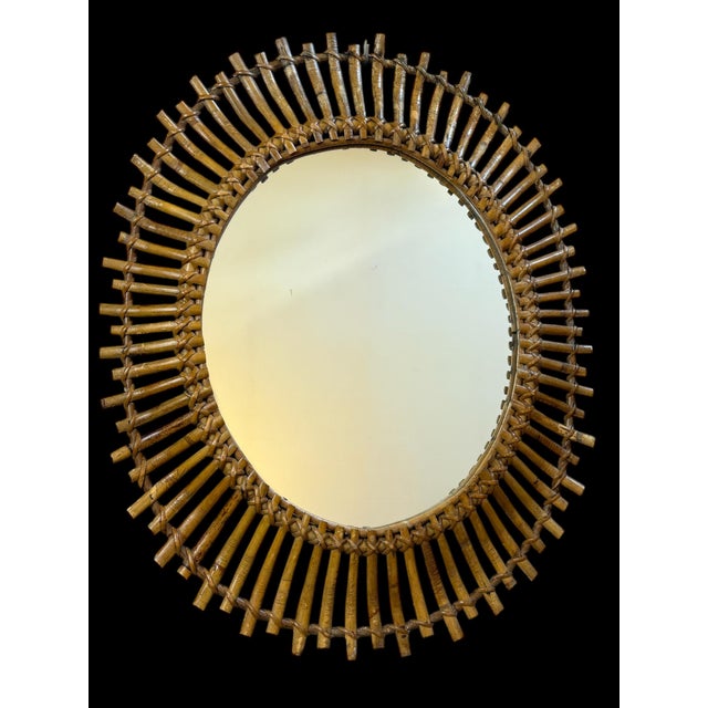 1950s rattan sunburst mirror. Handcrafted in the south of France.