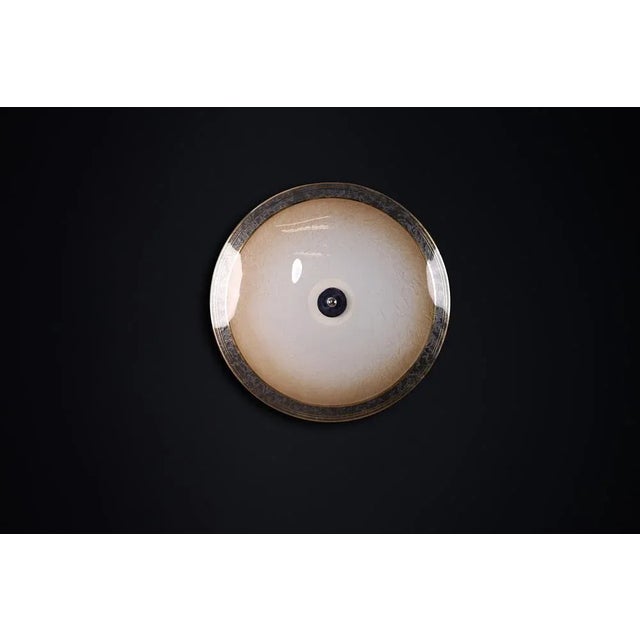 This lighting is a stunning example of mid-century design and graphics, showcased at the czechoslovakia pavilion during...