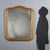 Carved and gilded wood mirror dating back to the late 19th century, originating from Italy. The frame features elegant...