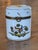 Vintage Sèvres porcelain box, oval and upright, painted on the front with a pair of colorful birds among small trees on a...