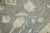 Introduce a touch of timeless elegance to your home with this Early 21st Century Gray Floral Design Handwoven Wool Turkish...