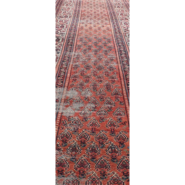 Distressed Antique Persian Malayer Runner With Field of Paisleys Design in Red 3'2"x15'2" For Sale - Image 4 of 12