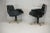 Pair of swivel armchairs, black leatherette and steel, Italy, circa 1960. Wear consistent with age (4 small discrete...
