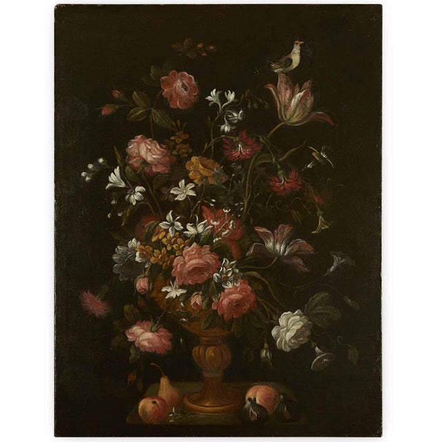 A pair of 17th-century Italian still lifes of flowers, unframed. Oil paintings on canvas with a dark background and finely...