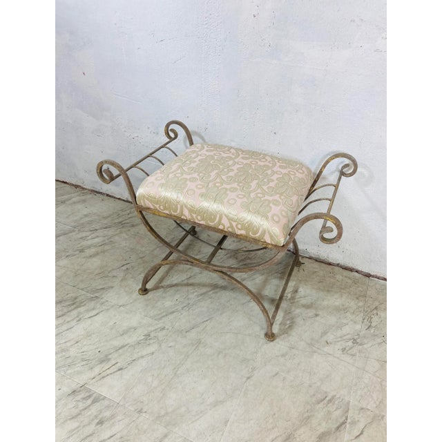 This lovely bench has a wonderful patina on the iron. It is slightly whitewashed with gold flecks throughout. The new...
