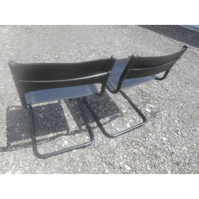 Vintage Mid-Century Modern Black Leather Sling Dining ... One common mid century upholstery technique is the use of fagas straps.