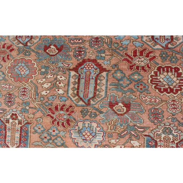 Antique Persian Bakhtiari Rug Featuring Repeating Floral Motifs and Rich Red 10 X 12 For Sale - Image 9 of 12