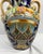 Vintage Italian majolica-style amphora vase featuring a rich cobalt blue glaze with hand-painted fruit and scrolling...