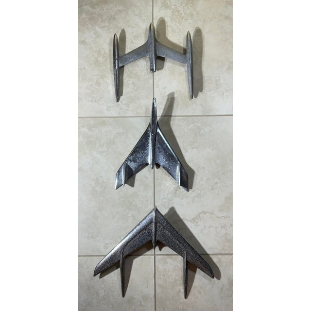 Transform your space with this unique and eye-catching industrial chic wall art! This stunning three-piece metal wall...