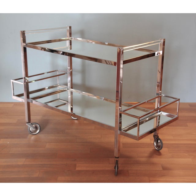This modernist bar cart was designed by Art Deco designer Jacques Adnet (1901-1984) in France in the 1930s. Typical of...