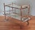 This modernist bar cart was designed by Art Deco designer Jacques Adnet (1901-1984) in France in the 1930s. Typical of...