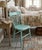 This antique farmhouse spindle-back side chair that is in solid condition and looks nice in a quaint, rustic way. It has...