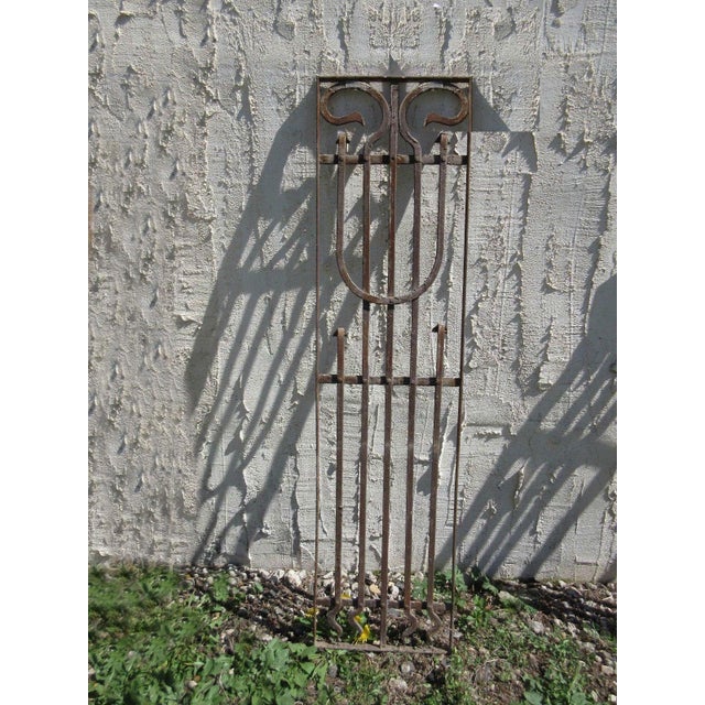 A piece of architectural salvage. Heavy and sturdy. Piece does show signs of age related wear including rust, flaking...