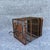 Add a touch of exotic elegance to your space with this vintage-style Chinese birdcage. Crafted from wood with a warm,...