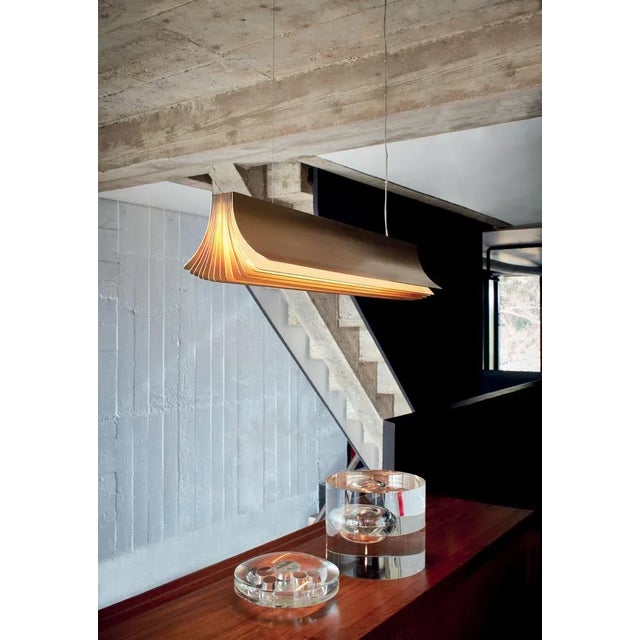 Small respiro pendant lamp by philippe nigro dimensions: d 90 x w 16 x h 15 cm materials: aluminum available in 2 sizes:...