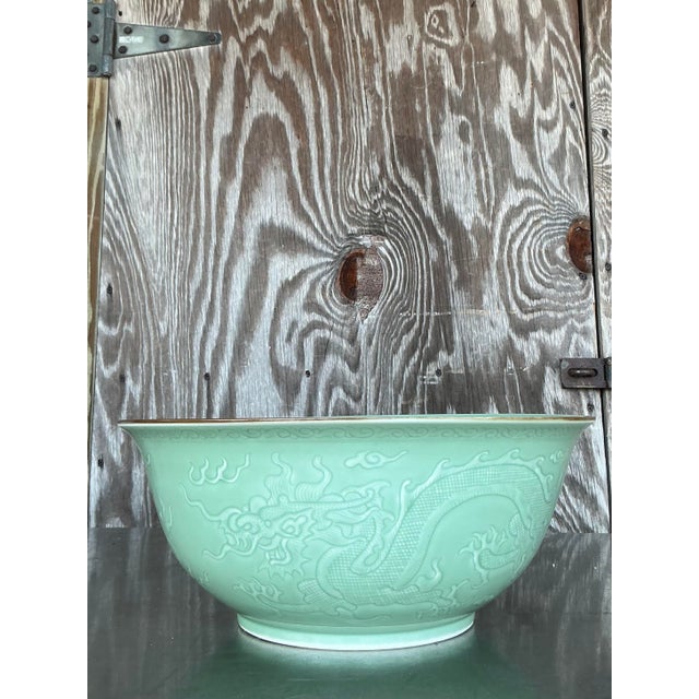 Command attention with this truly monumental vintage Asian bowl, showcasing masterful craftsmanship and timeless design....