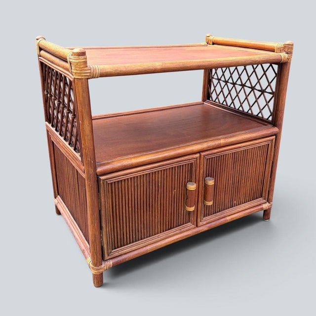 Vintage Bamboo & Rattan Media Cabinet | Hollywood Regency TV Stand | Boho Storage Unit A beautifully crafted vintage...
