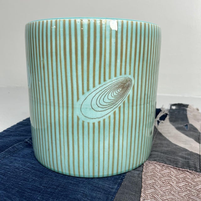 Beautiful vintage Japanese hibachi from the 1970s, featuring a refined turquoise glaze with a striped pattern and an...
