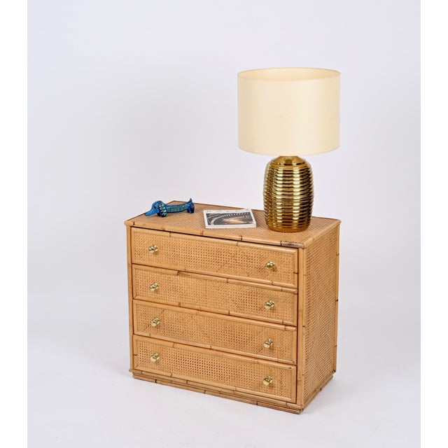 Stunning table lamp in brass with round beige lampshade designed by tommaso barbi and produced in italy during the 1970s....