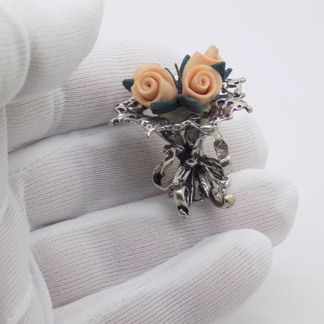 A vintage Italian silver miniature from the 1980s and 1990s, stamped 800. The flowers are not made of silver, but the...