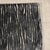 Handmade in the USA, this textured cut velvet throw pillow cover features a rich charcoal black and beige ribbed abstract...