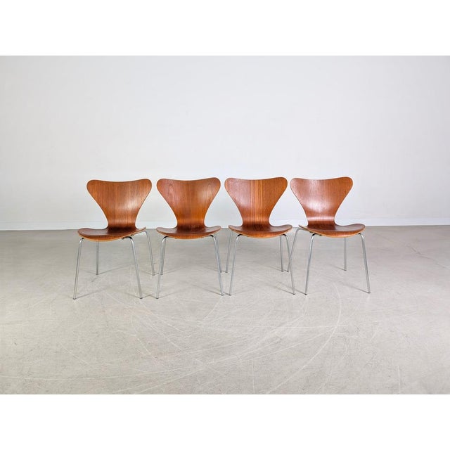 Four of a total of 31 original Fritz Hansen Series 7 (Model 3107) chairs. These stackable chairs were designed by Arne...